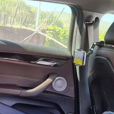 Support téléphone voiture MultiTelSup fixé à l'appui-tête